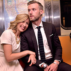 Bride and groom on subway train